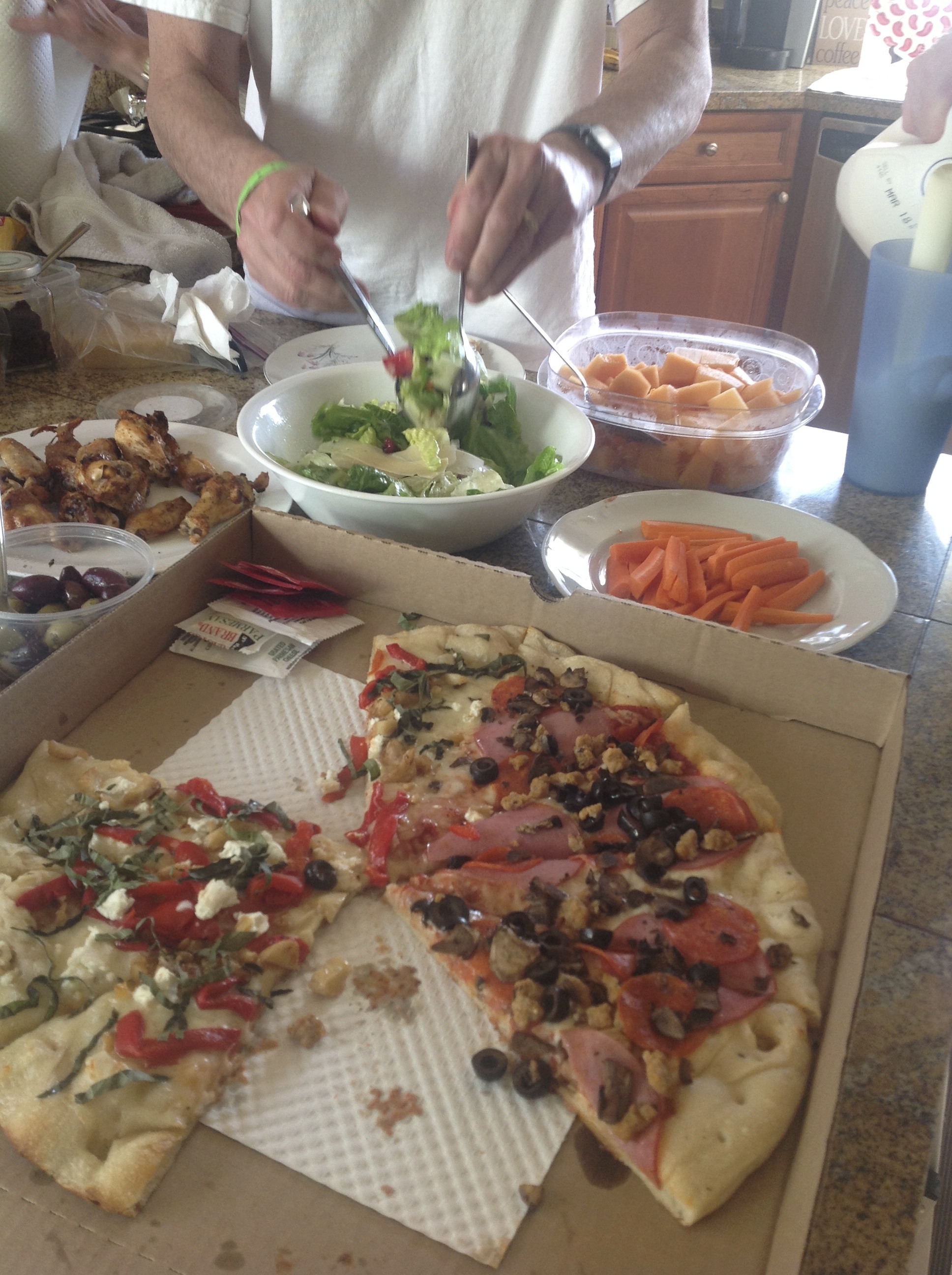 pizza,chicken wings,salad (we invited my inlaws for dinner)