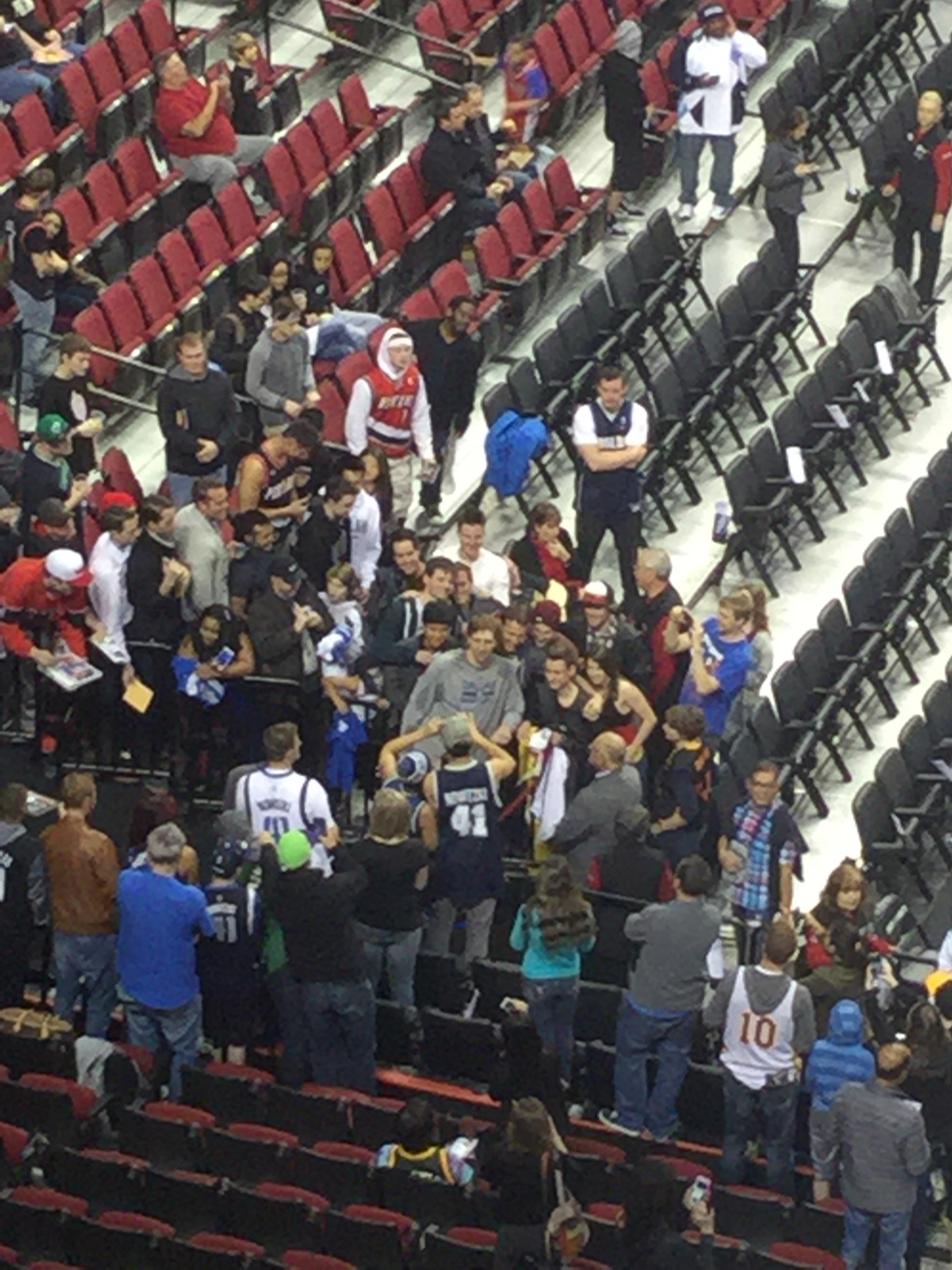 Dirk is the guy wearing gray shirt, he was practicing before the game started! Truly a class act, he took the time to take pictures and sign autographs  to fans, you can really tell he appreciates them and happy to do so!